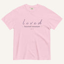 Pink t-shirt with 'loved beyond measure' text on a white background