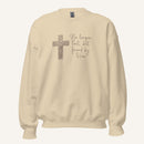 cream sweatshirt with cross design and 'No longer lost, but found by Him' text on a cream background