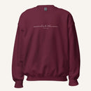 maroon sweatshirt with 'Searched & known' text