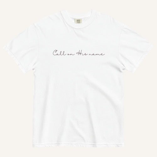 White t-shirt with 'Call on his name' text on a white background