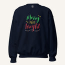 navy crewneck sweatshirt with "Merry & Bright" colorful text with Christmas lights and star graphics