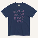 true navy t-shirt with 'Today's a Good Day to Praise Jesus' pink text on a cream background