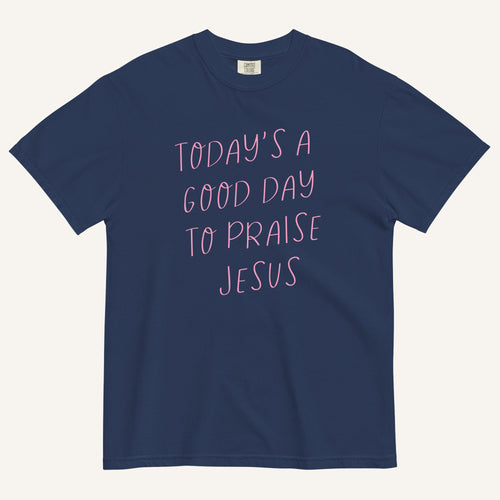 true navy t-shirt with 'Today's a Good Day to Praise Jesus' pink text on a cream background