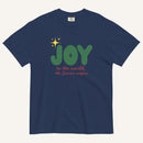 a navy t-shirt with the words "Joy to the world, the Savior reigns" in bold colorful font with a star graphic