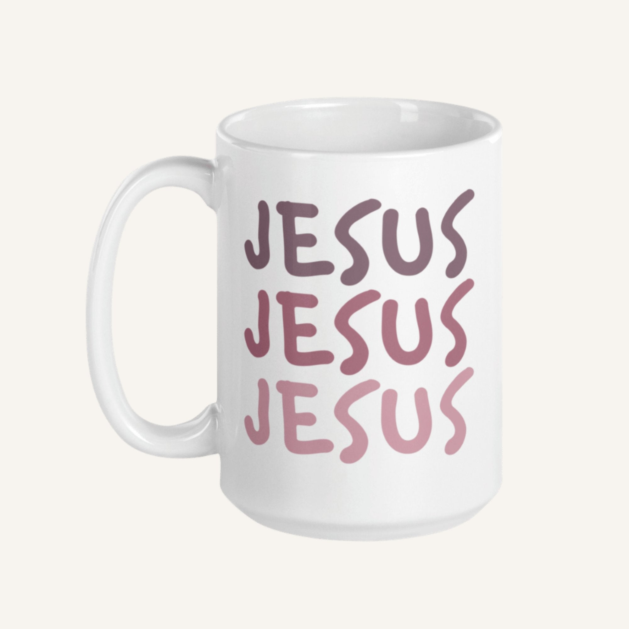 White 15 oz mug with 'JESUS JESUS JESUS' printed in pink on a white background