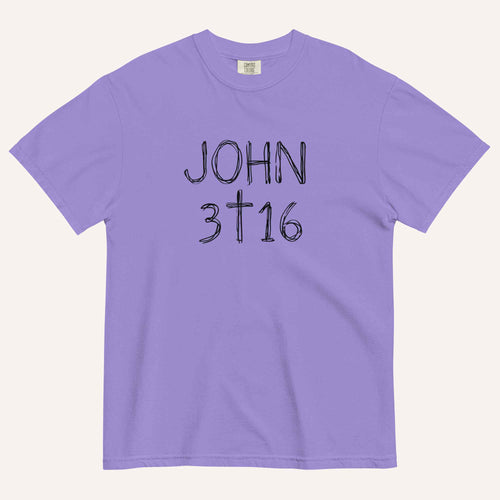 A lavender purple short-sleeve crewneck t-shirt with 'JOHN 3 16' text with cross graphic in between the 3 & 16 printed in a black hand-drawn font on the chest, displayed flat against a light cream background.