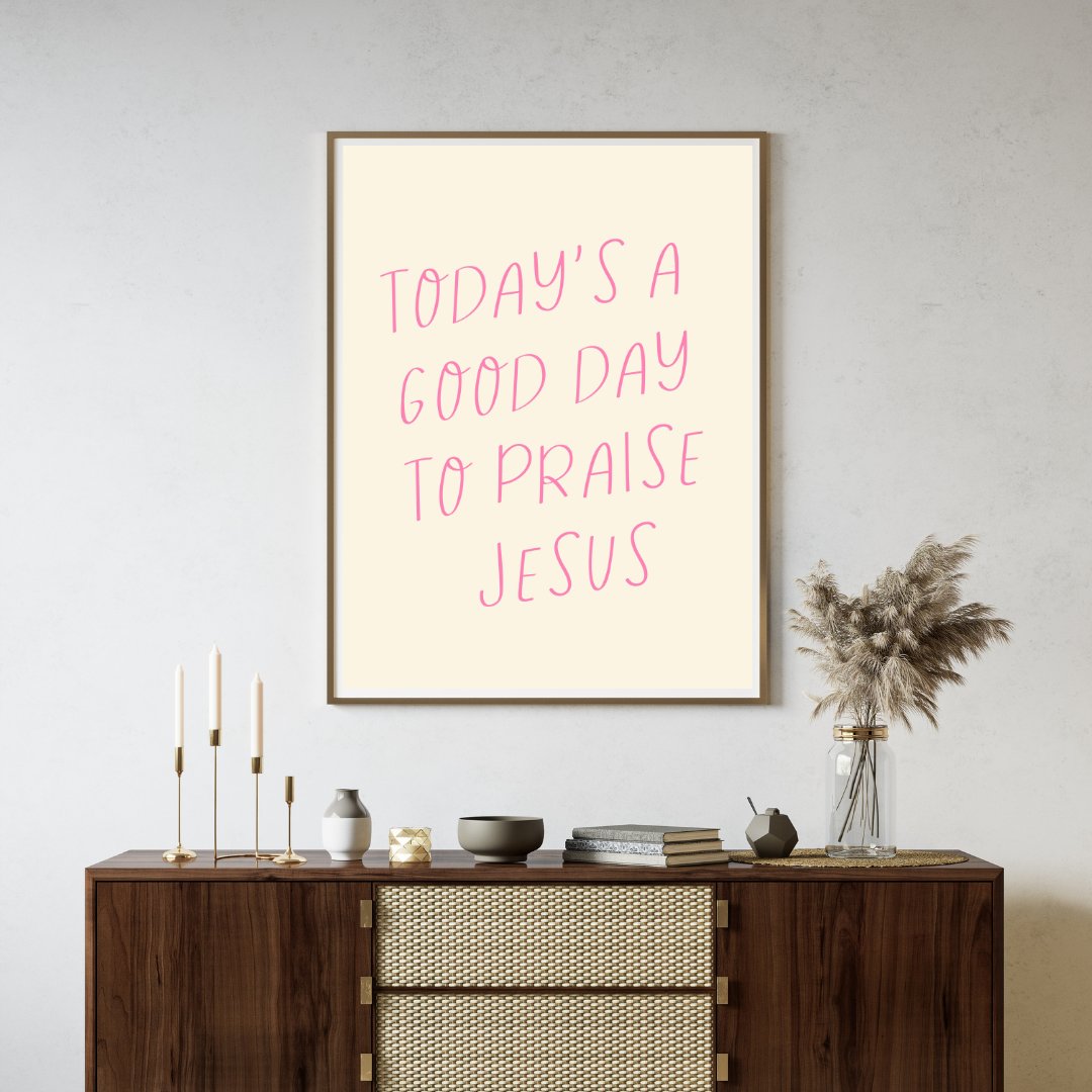 'Today's a Good Day to Praise Jesus' text on a cream background wall art in a neutral living room
