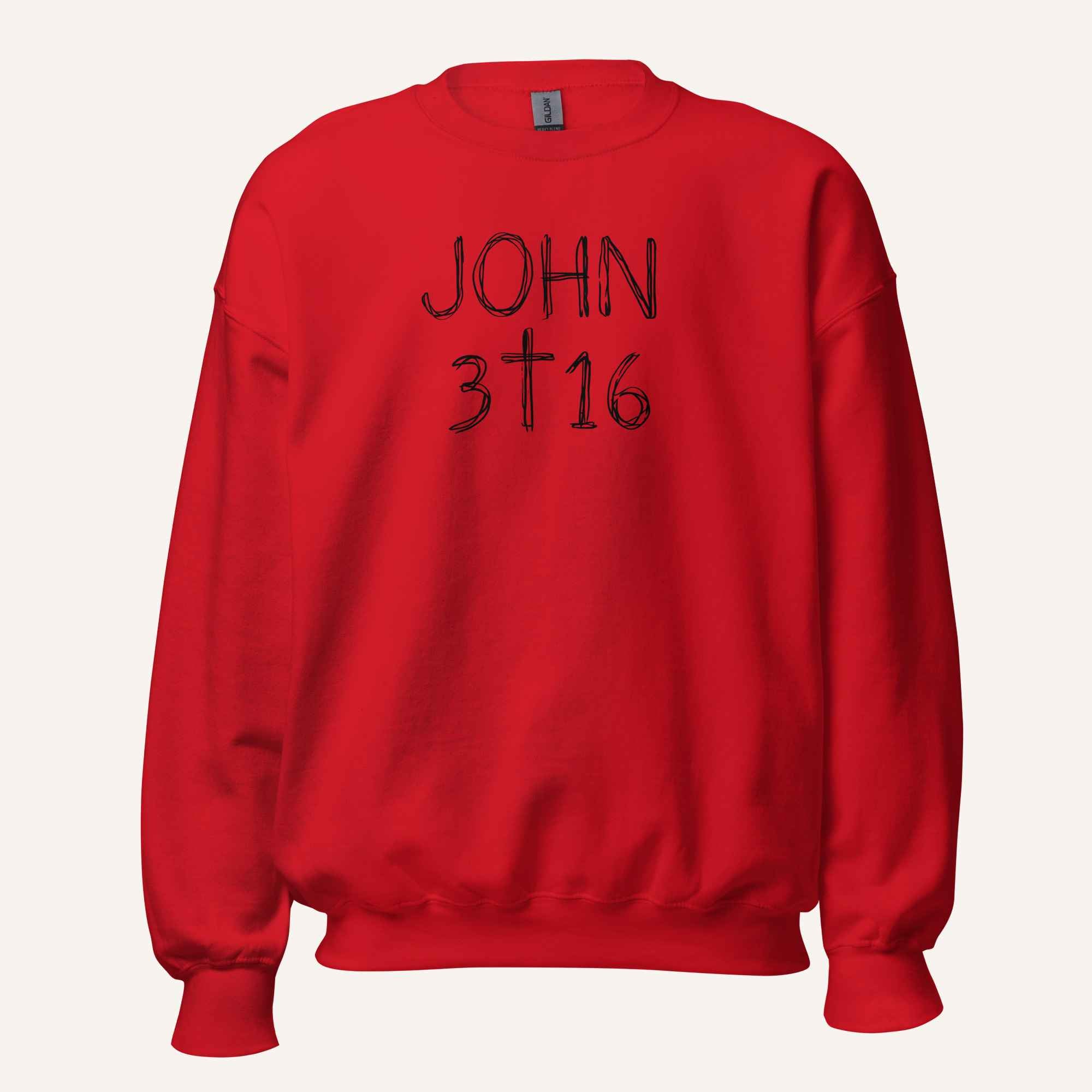a bright red crewneck sweatshirt with 'John 3 16' text with cross graphic between the 3 & 16 on a light cream background