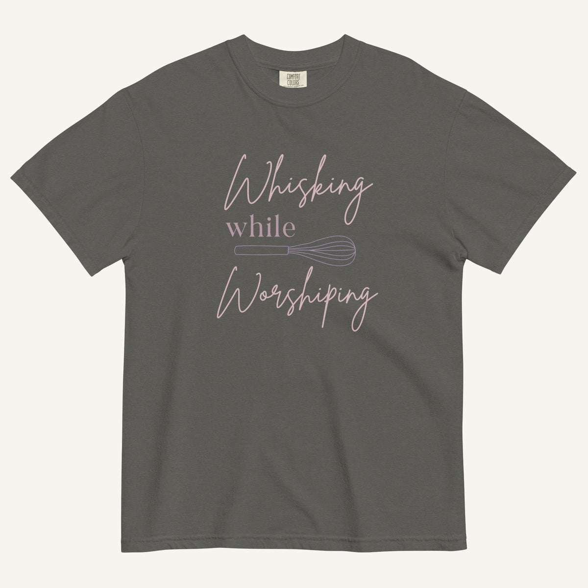 light grey t-shirt with "Whisking while worshiping" text and a whisk graphic