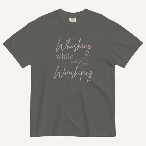 light grey t-shirt with "Whisking while worshiping" text and a whisk graphic
