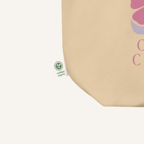 Beige product with a green certified organic logo on a white background