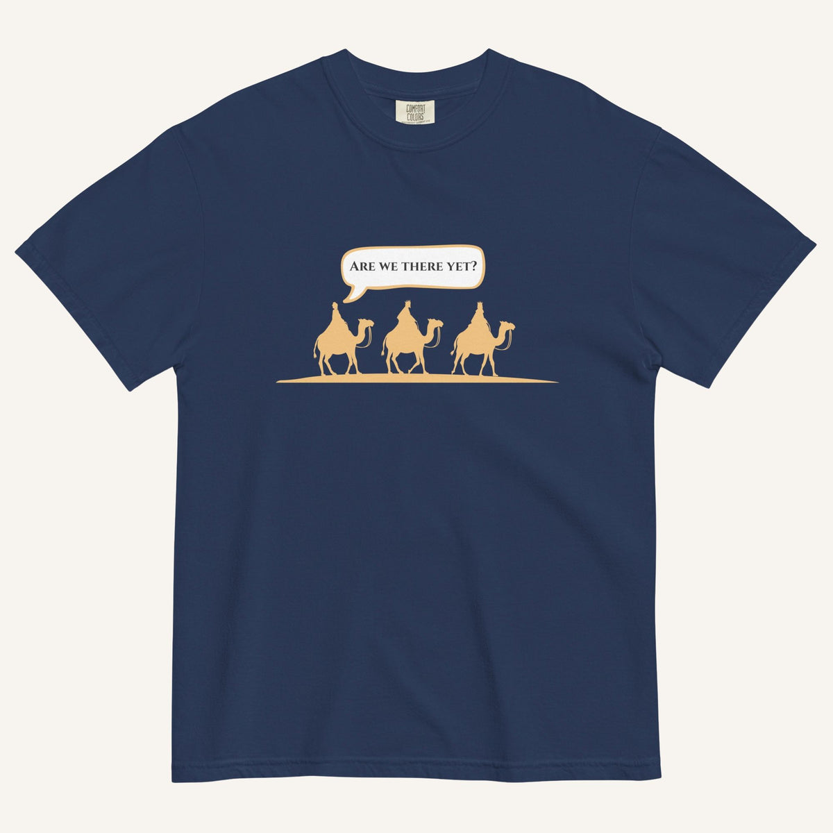 a navy blue t-shirt with 3 men riding camels in the color yellow with a chat bubble with the text "are we there yet?"