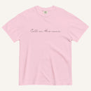 Pink t-shirt with 'Call on his name' text on a white background