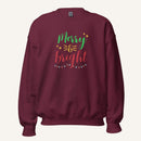 maroon crewneck sweatshirt with "Merry & Bright" colorful text with Christmas lights and star graphics