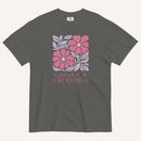 gray t-shirt with floral graphic and 'Chosen & Cherished' text on a cream background