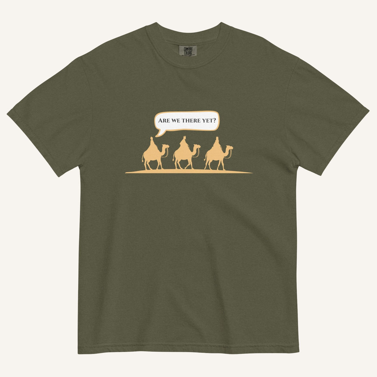 an army green t-shirt with 3 men riding camels in the color yellow with a chat bubble with the text "are we there yet?"