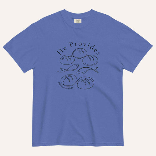 A blue short-sleeve t-shirt with a black graphic print on the front showing fish and loaves of bread, with the text 'He Provides' and 'Matthew 14:13-21'.