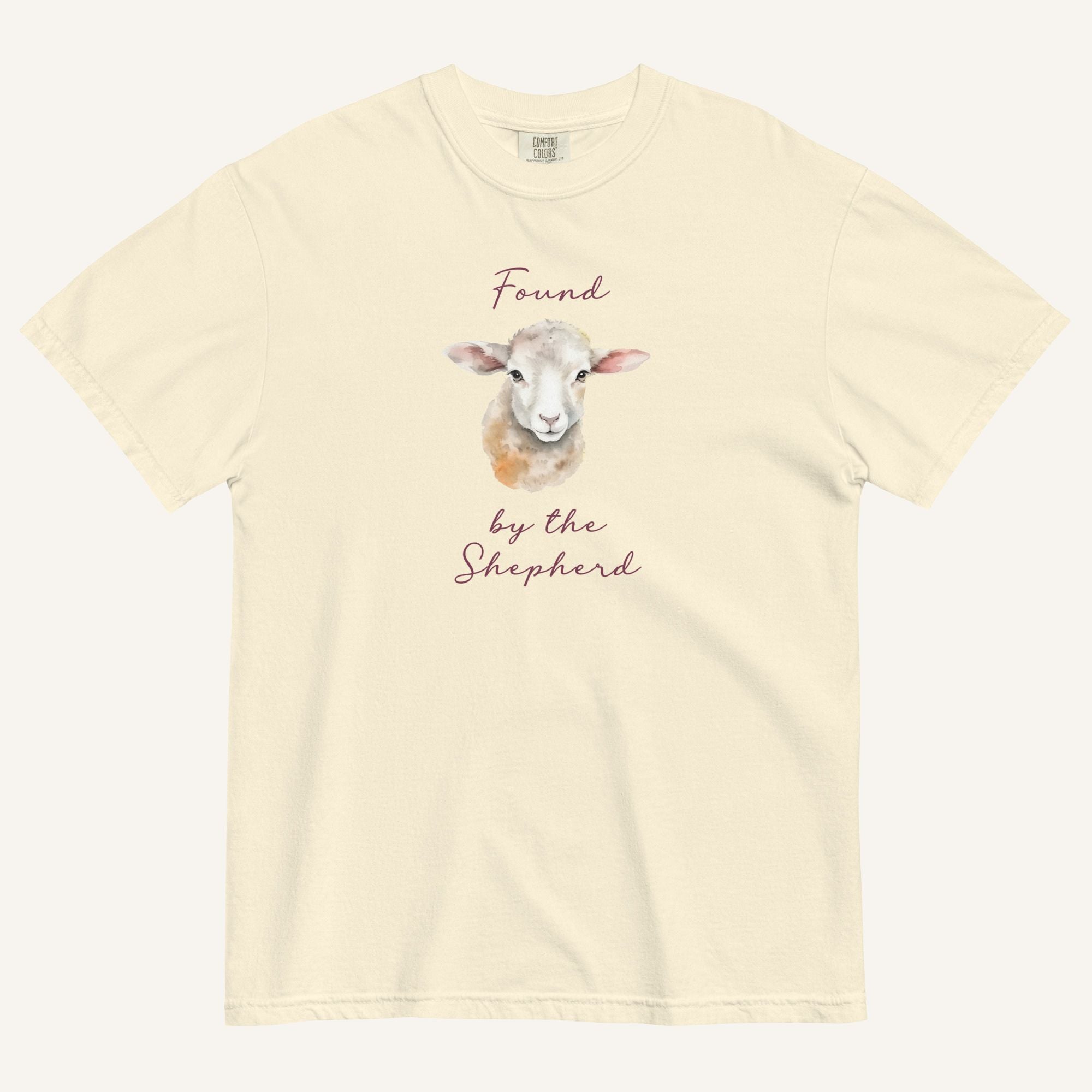 Ivory t-shirt with watercolor lamb and 'Found by the Shepherd' text on cream background
