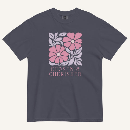 navy t-shirt with floral graphic and 'Chosen & Cherished' text on a cream background