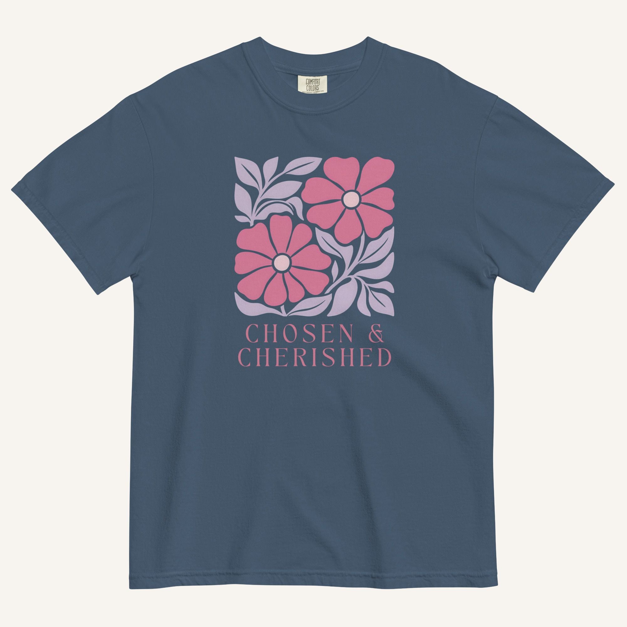 muted blue t-shirt with floral graphic and 'Chosen & Cherished' text on a cream background