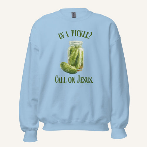 light blue crewneck sweatshirt with a pickle jar graphic and 'In a Pickle? Call on Jesus' text on a cream background