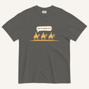 a grey t-shirt with 3 men riding camels in the color yellow with a chat bubble with the text "are we there yet?"