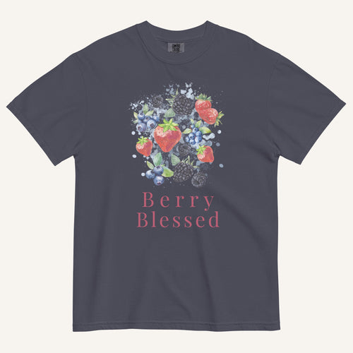 A dark gray crewneck t-shirt featuring a watercolor-style graphic of strawberries, blueberries, and blackberries with the text 'Berry Blessed' printed below in pink, displayed on a light cream background.