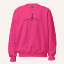 A bright pink crewneck sweatshirt featuring a black line art graphic of a cross on top of simple mountains on the chest, displayed against a solid off-white background.