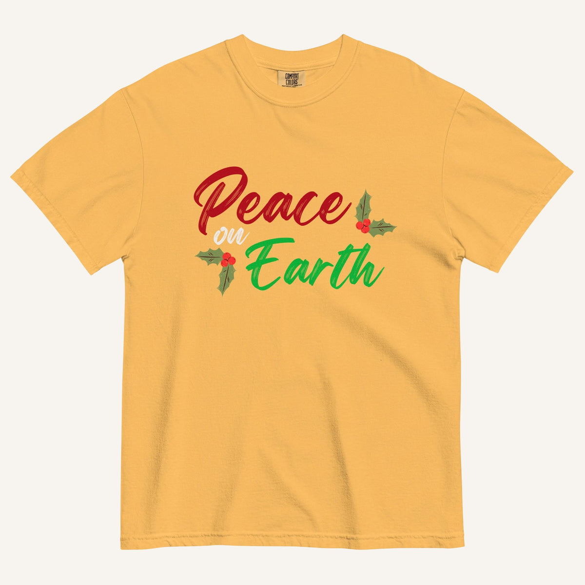a yellow t-shirt with the text "Peace on Earth" and small botanical graphics