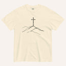 An off-white crewneck t-shirt featuring a minimalist black line art graphic of a cross on a hill, displayed flat against a matching off-white background.