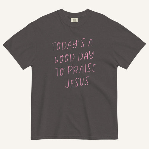 grey t-shirt with 'Today's a Good Day to Praise Jesus' pink text on a cream background
