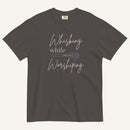 grey t-shirt with "Whisking while worshiping" text and a whisk graphic