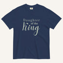 Bright navy blue t-shirt with 'Daughter of the King' text on a white background