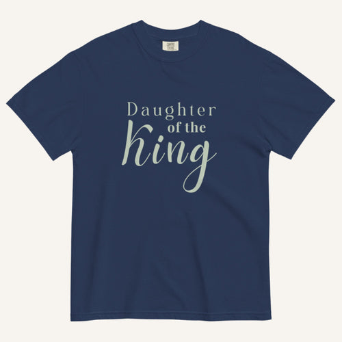 Bright navy blue t-shirt with 'Daughter of the King' text on a white background