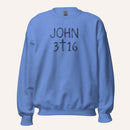 a light blue crewneck sweatshirt with 'John 3 16' text with cross graphic between the 3 & 16 on a light cream background