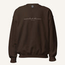 brown sweatshirt with 'Searched & known' text