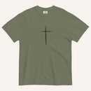 A short-sleeve crewneck t-shirt in an army green color, featuring a simple black Christian cross printed on the center chest. The t-shirt is laid flat against a solid, warm off-white background.