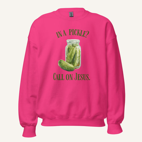 hot pink crewneck sweatshirt with a pickle jar graphic and 'In a Pickle? Call on Jesus' text on a cream background