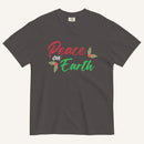 a grey t-shirt with the text "Peace on Earth" and small botanical graphics