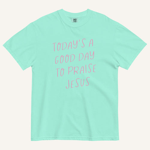 mint green t-shirt with 'Today's a Good Day to Praise Jesus' pink text on a cream background