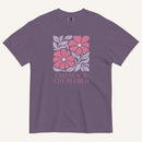 purple t-shirt with floral graphic and 'Chosen & Cherished' text on a cream background