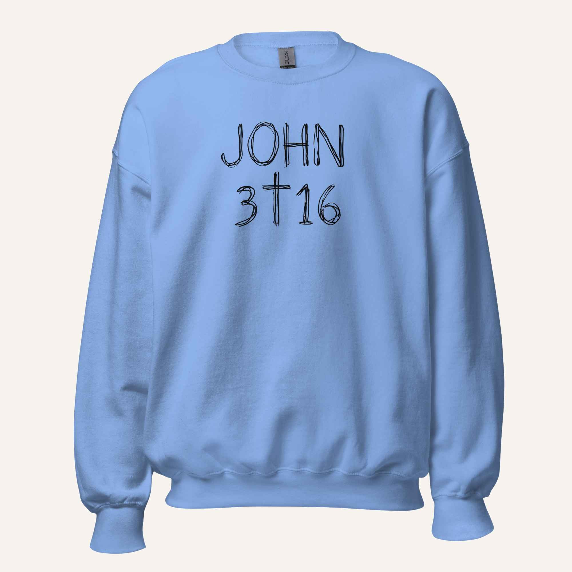 a light pastel blue crewneck sweatshirt with 'John 3 16' text with cross graphic between the 3 & 16 on a light cream background