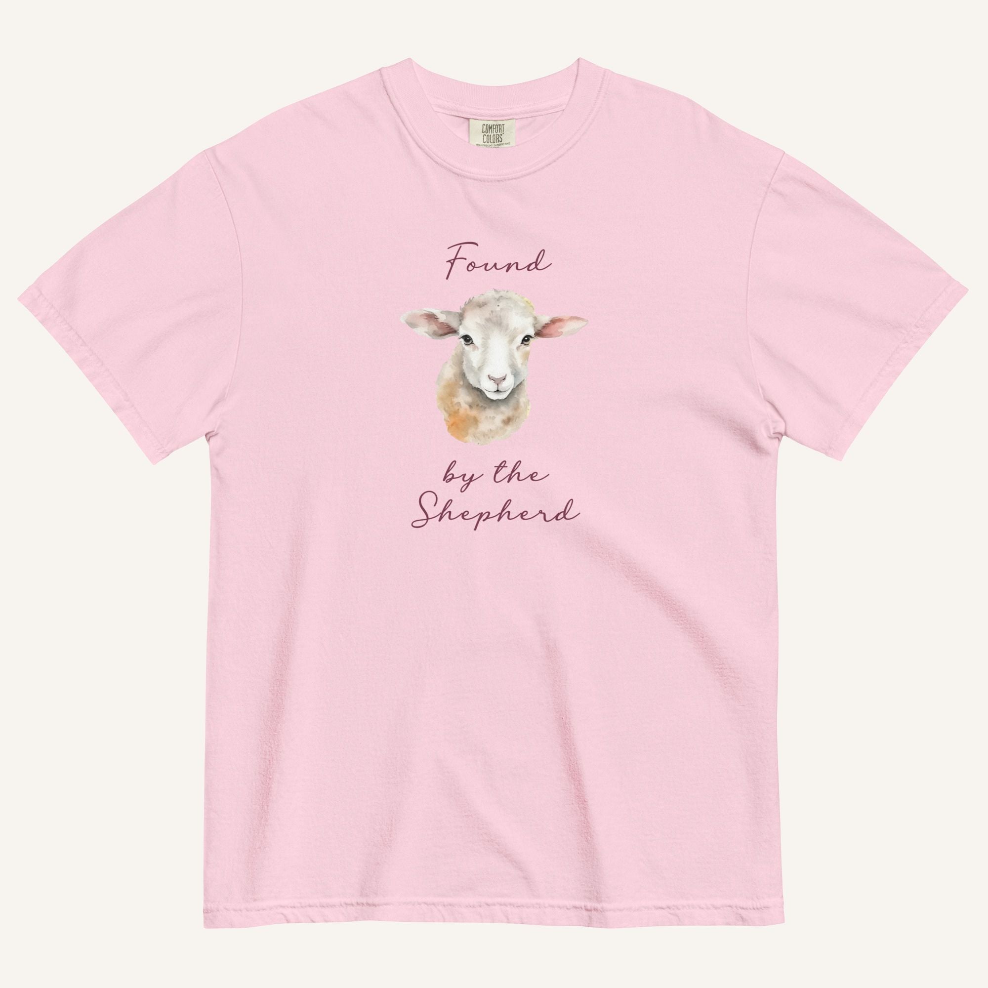 light pink t-shirt with watercolor lamb and 'Found by the Shepherd' text on cream background