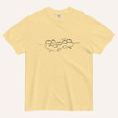 A yellow short-sleeve crewneck t-shirt with a black graphic of two fish and 5 loaves of bread on a line and the cursive text 'Everyone Ate' across the chest, displayed flat against a light beige background.