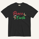 a black t-shirt with the text "Peace on Earth" and small botanical graphics