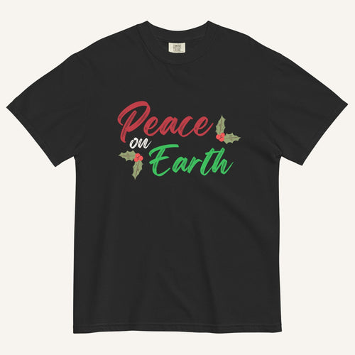 a black t-shirt with the text "Peace on Earth" and small botanical graphics