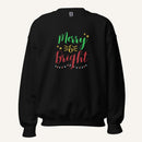 black crewneck sweatshirt with "Merry & Bright" colorful text with Christmas lights and star graphics