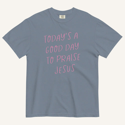 light muted blue t-shirt with 'Today's a Good Day to Praise Jesus' pink text on a cream background