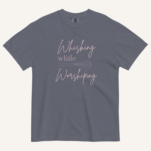 muted grey blue t-shirt with "Whisking while worshiping" text and a whisk graphic