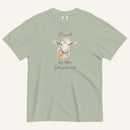 sage green t-shirt with watercolor lamb and 'Found by the Shepherd' text on cream background